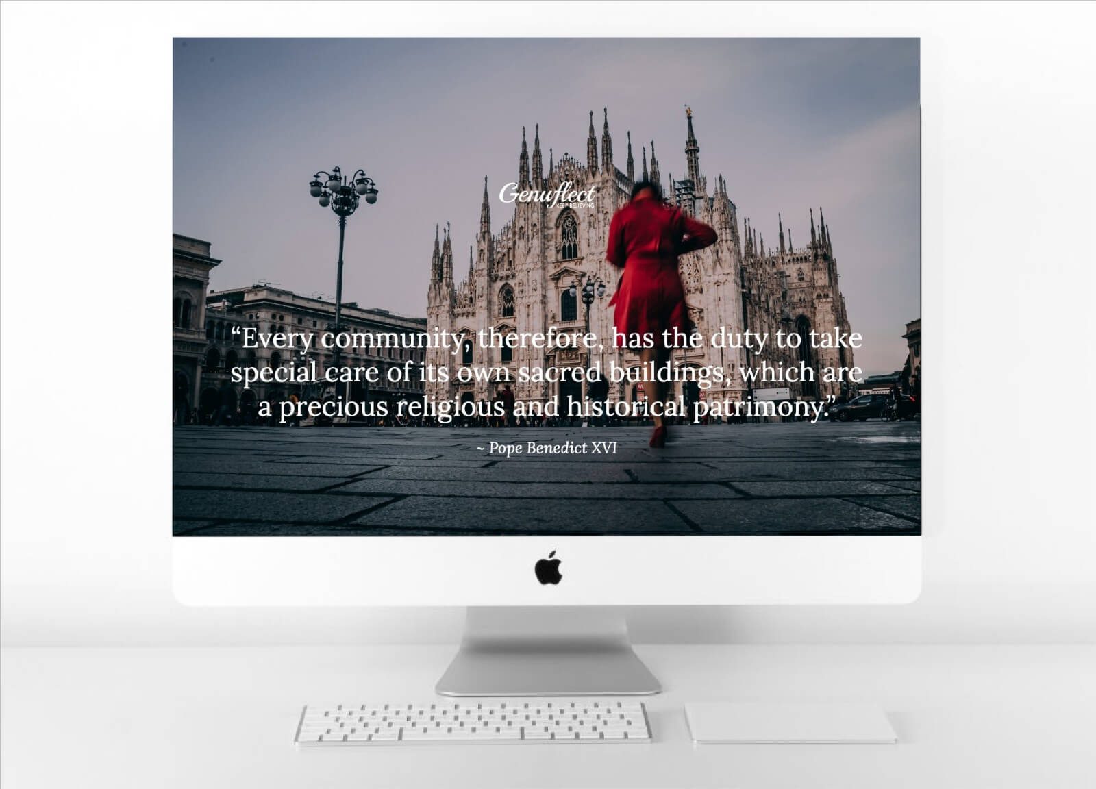 Background image on computer of Woman in red overcoat walking outside in front of a Catholic Basilica