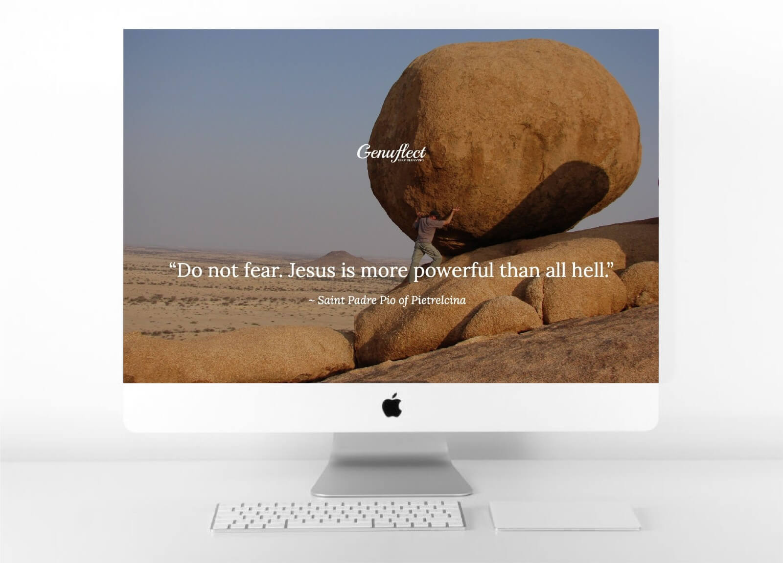Genuflect computer background image of a A man posing as if holding up a large boulder