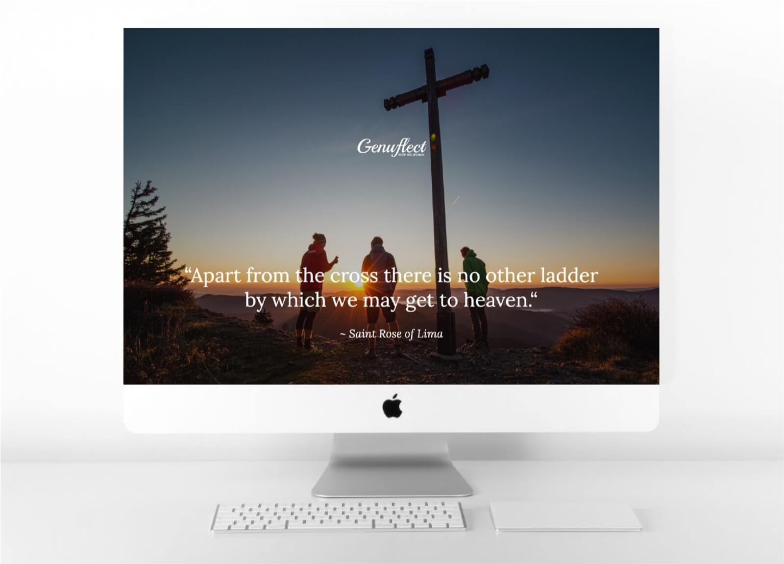 Genuflect - Computer with image on background of Three people and a wooden cross on a mountaintop at sunrise