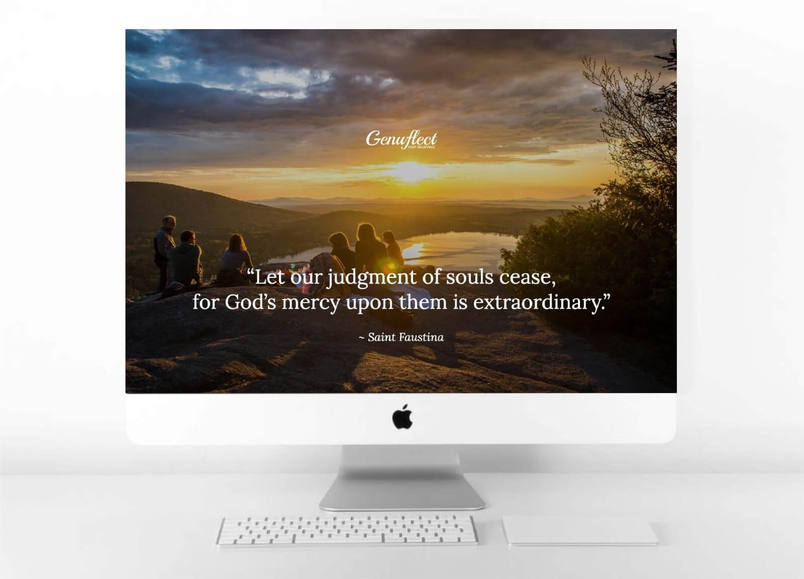 Genuflect image on background of computer of A group of people sitting on a mountain overlooking a lake at sunset