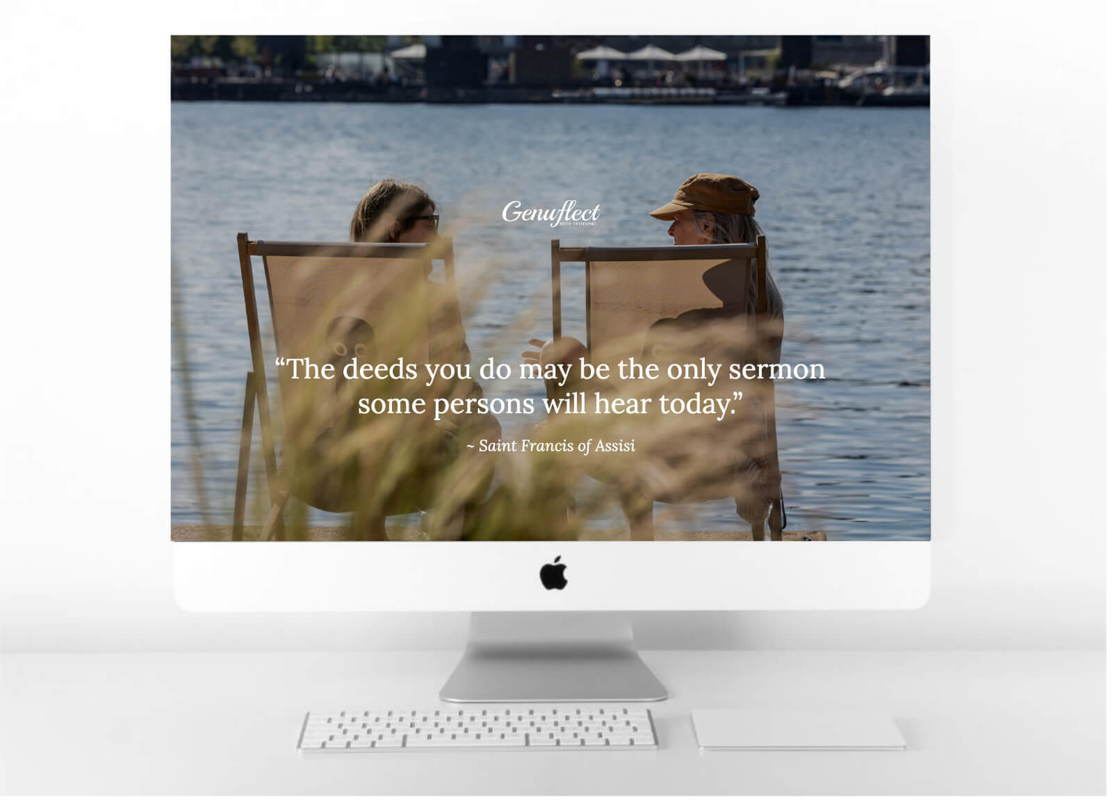 Genuflect computer background image of Two people sitting on the shore of a lake talking