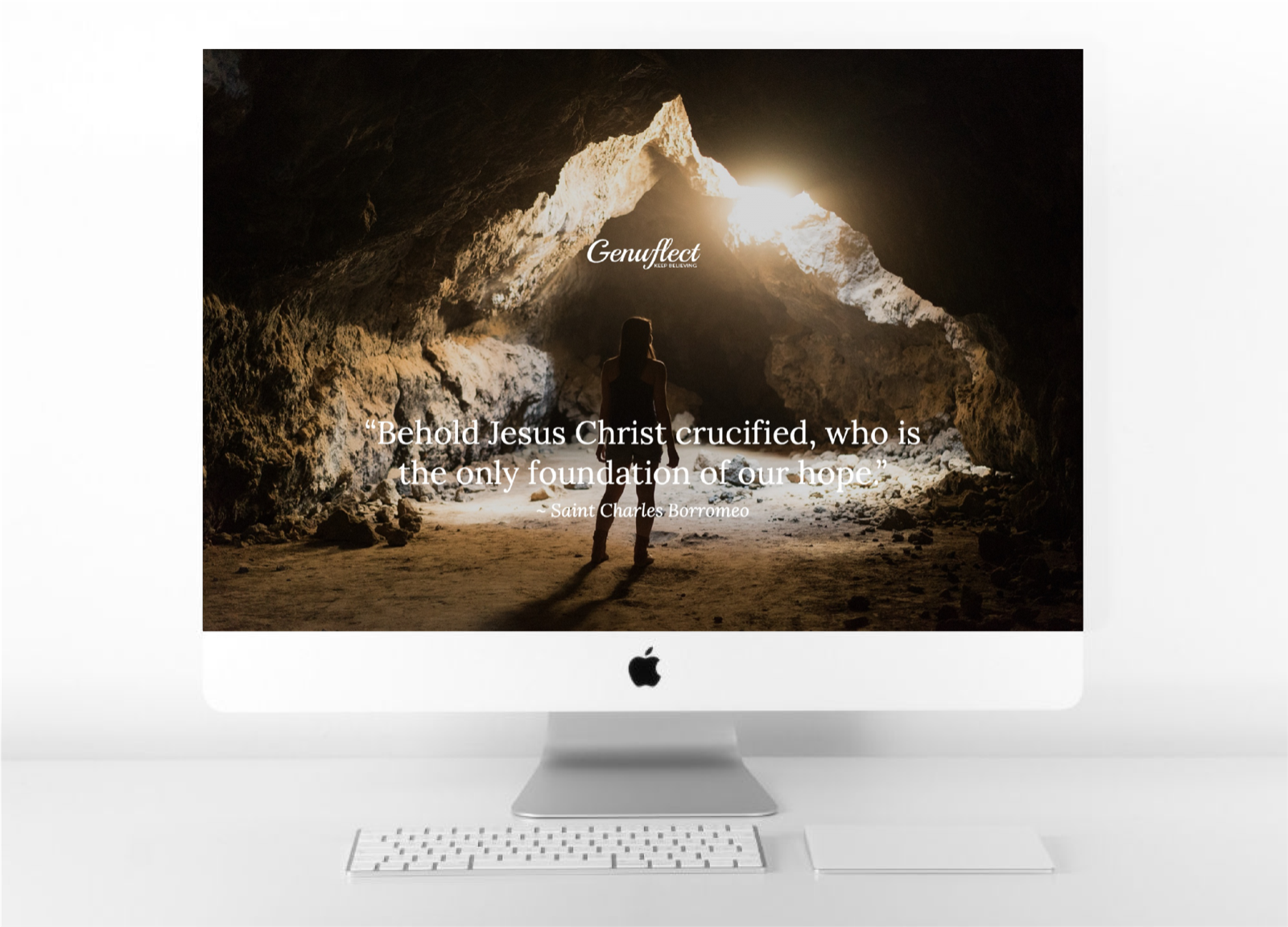 Genuflect - Background image on computer of woman in cave with bright sun shining from above