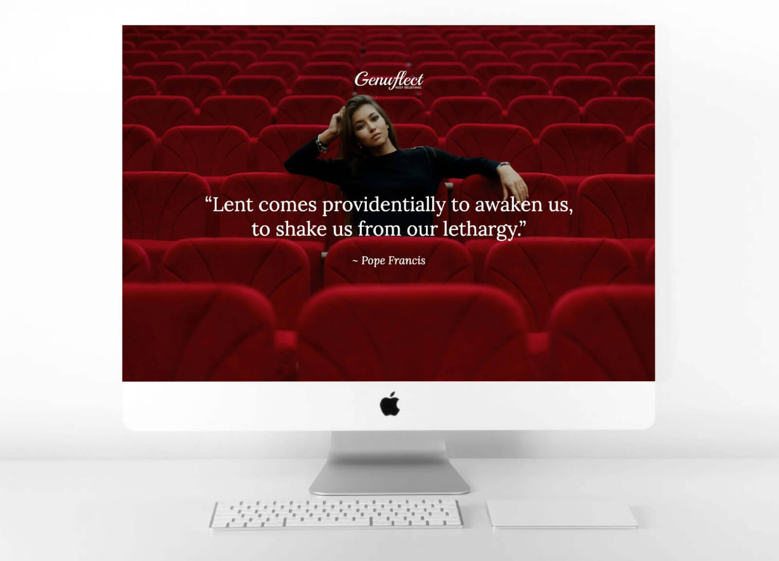 Genuflect computer background image of a Woman sitting alone in a movie theater
