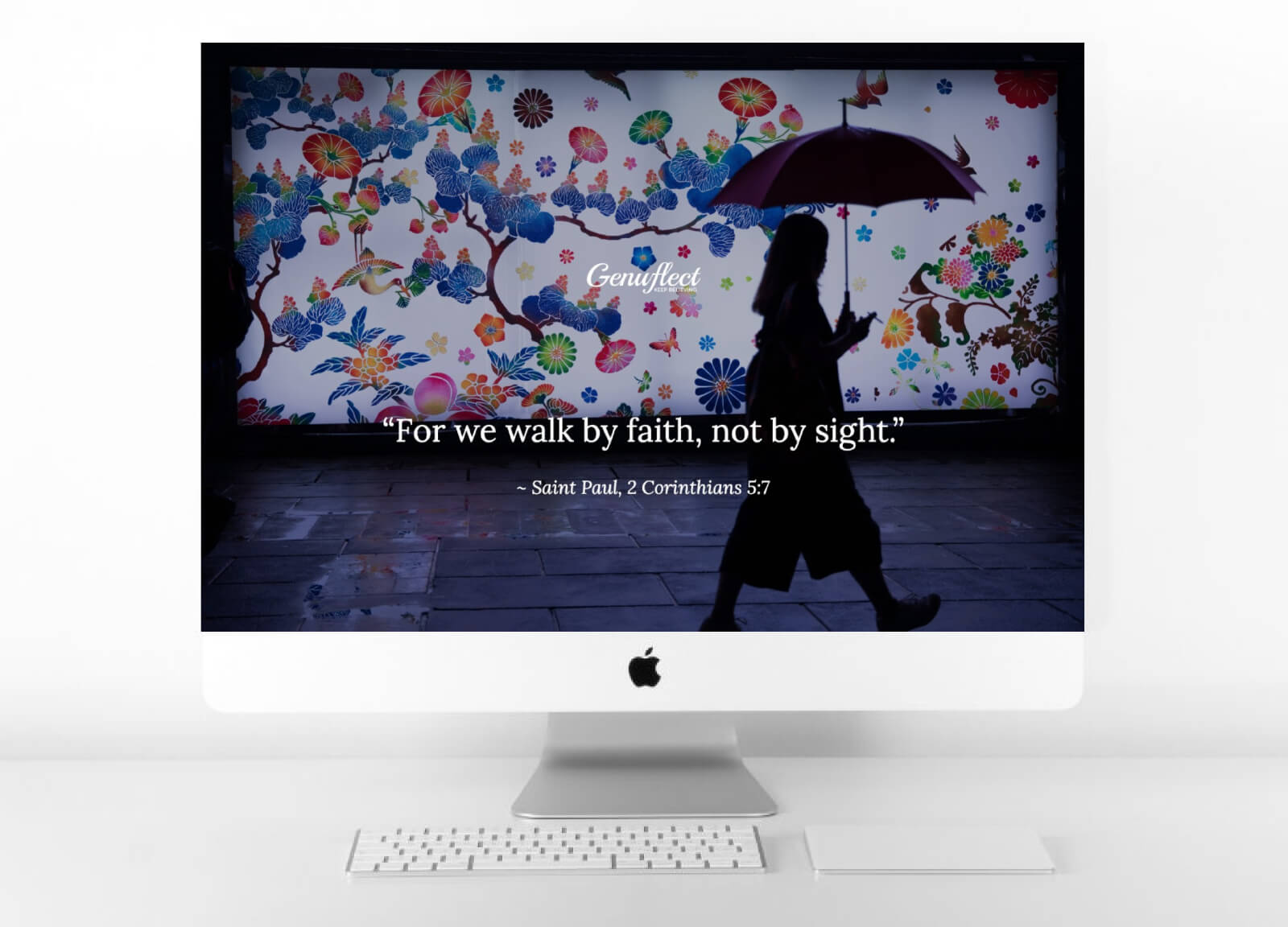 Genuflect computer background image of a Silhouette of a woman walking with an umbrella in front of a colorful wall with a floral mural