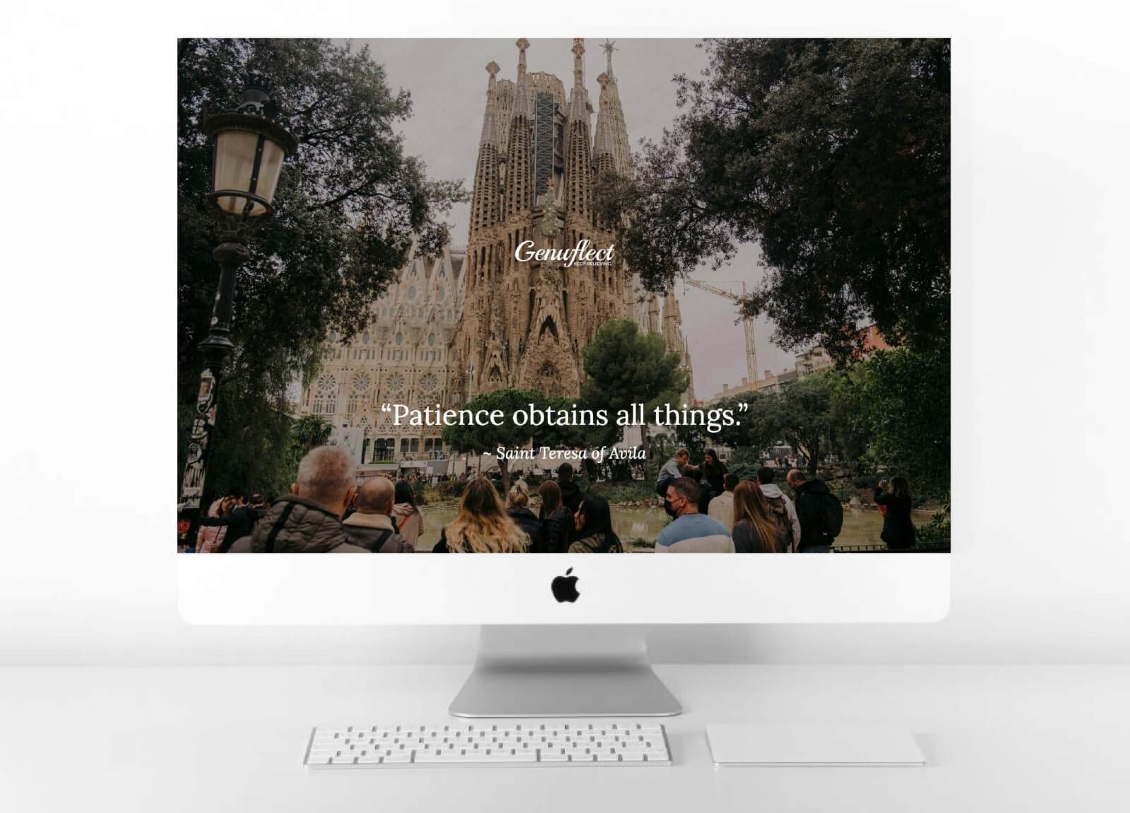 Genuflect computer background image of Exterior image of the Sagrada Família Basilica in Barcelona Spain.