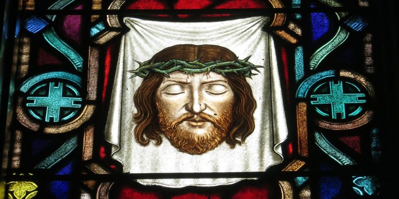 Stained Glass window image of Jesus' holy face on Veronica's veil