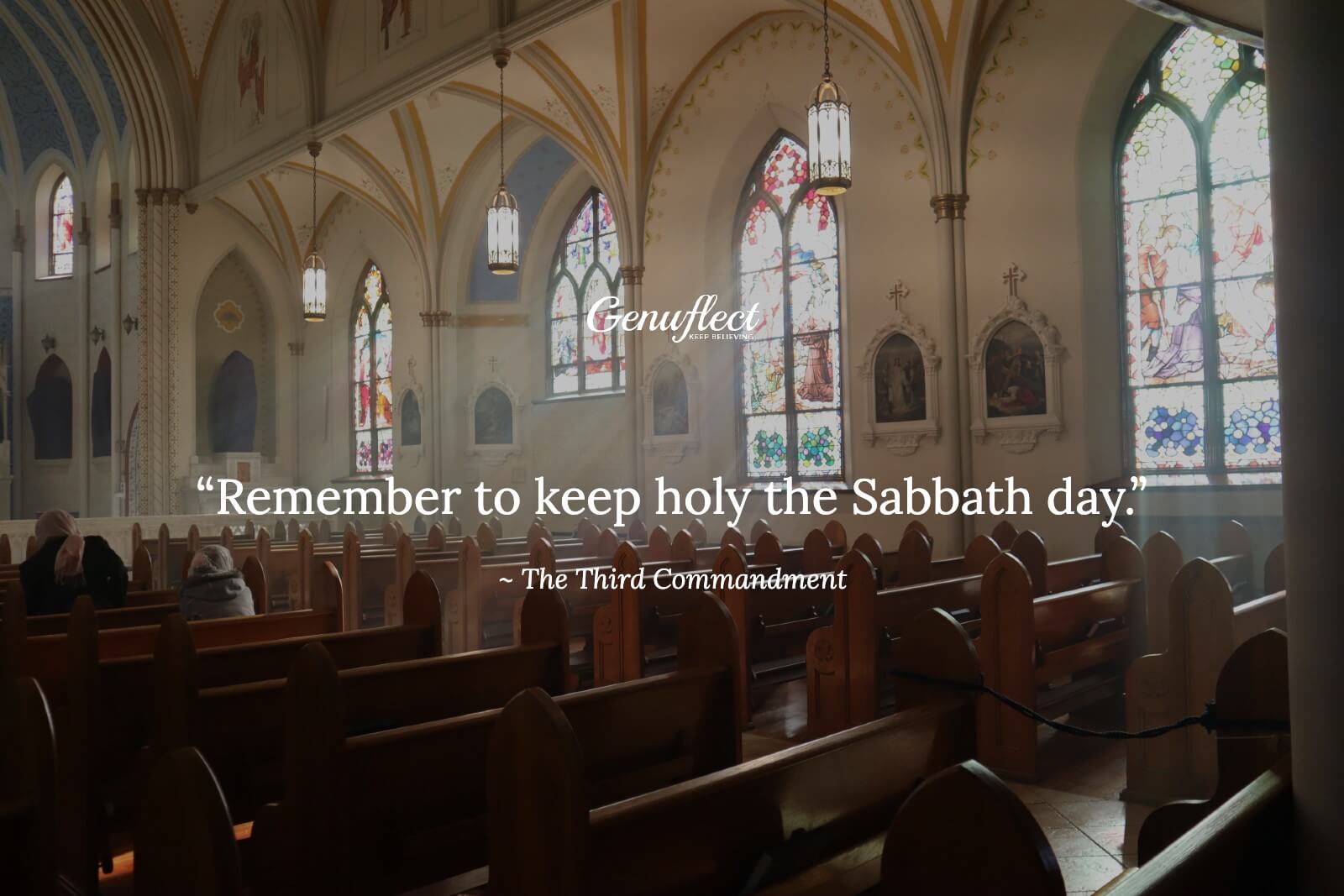 Pews in a mostly empty Catholic Church with just a few people