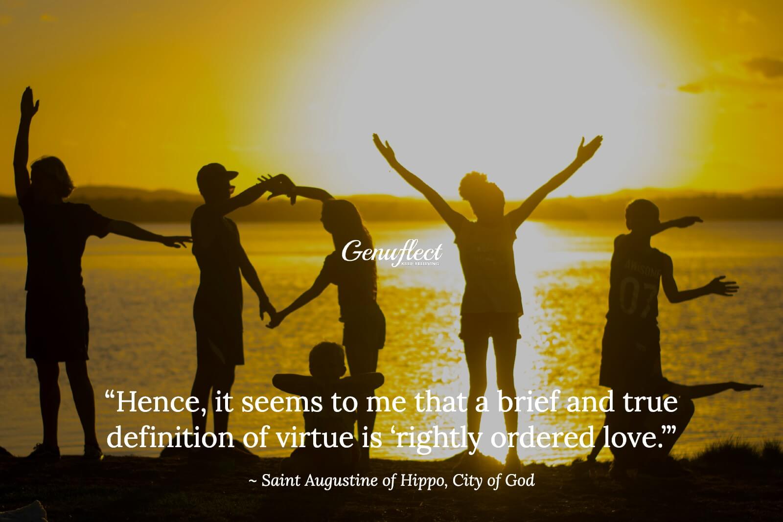 Silhouette of several people forming the word love with their bodies in front of the sunset over a body of water