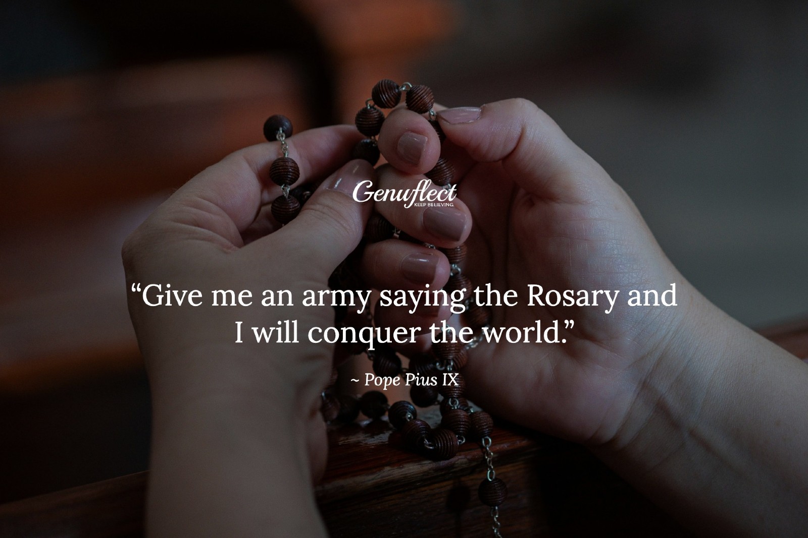 Close up of woman's hands holding and praying the Rosary