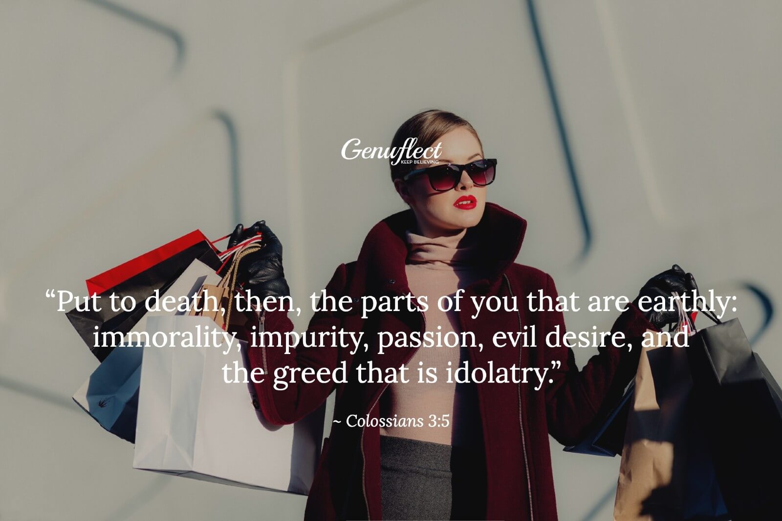 Glamorous woman holding shopping bags in both hands
