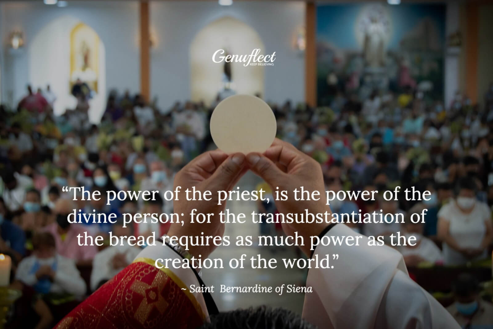 Close up of a priest raising up the Holy Eucharistic during Mass