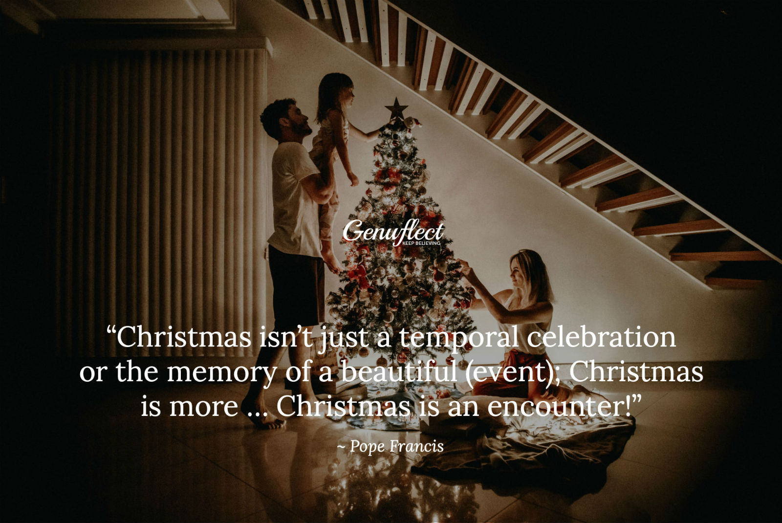 Genuflect - family decorating a Christmas tree