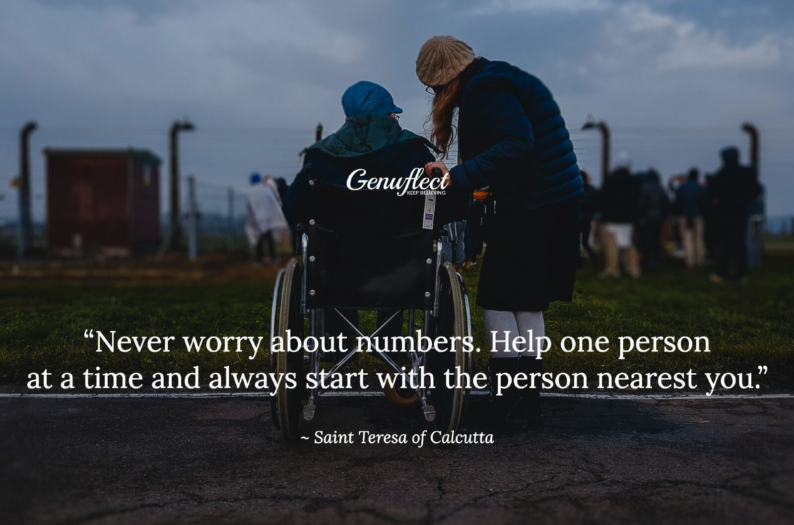 Woman helping another woman who is in a wheelchair