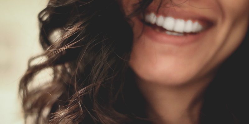 Close up of woman's mouth with big smile