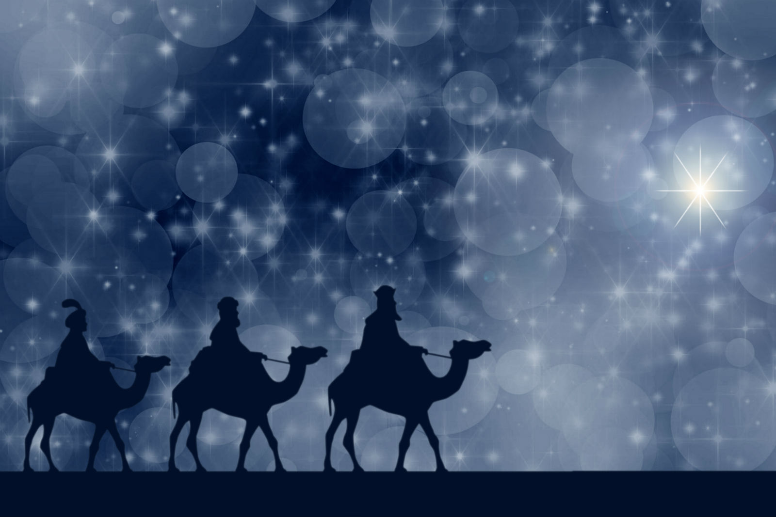 Three Magi on camels following the Bethlehem star